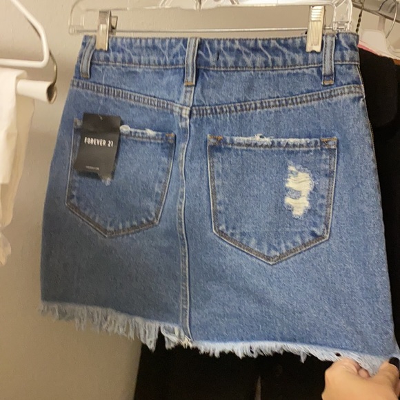 Mini ripped Jean skirt - Picture 2 of 2